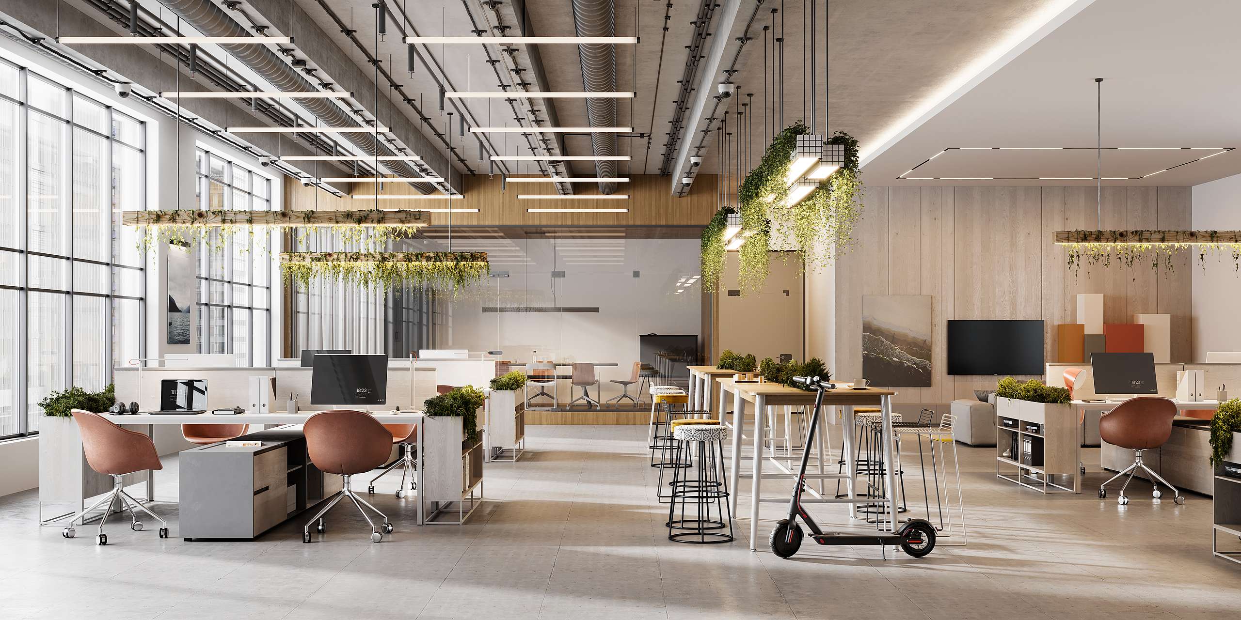 open plan office that is a light grey, with brown accents, such as chairs. Plus with plants, showing a green/energy efficient office.